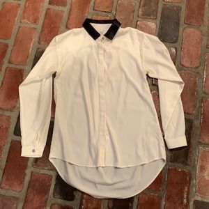 Oversized, button-down top.